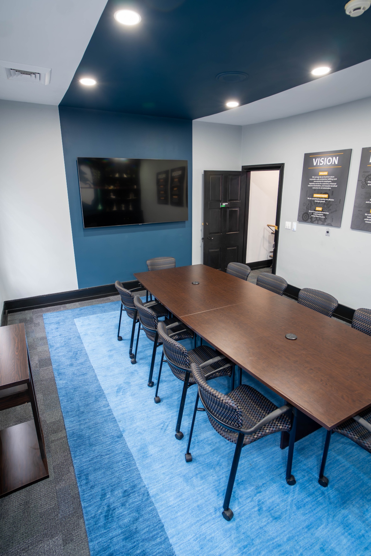 Conference room from above with branded vision wall art