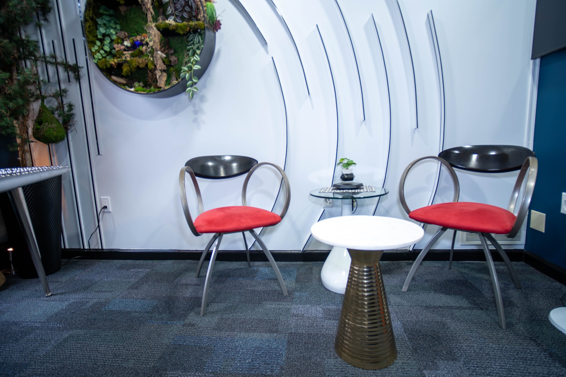 Lounge with arched ribbed wall detail and curated styling