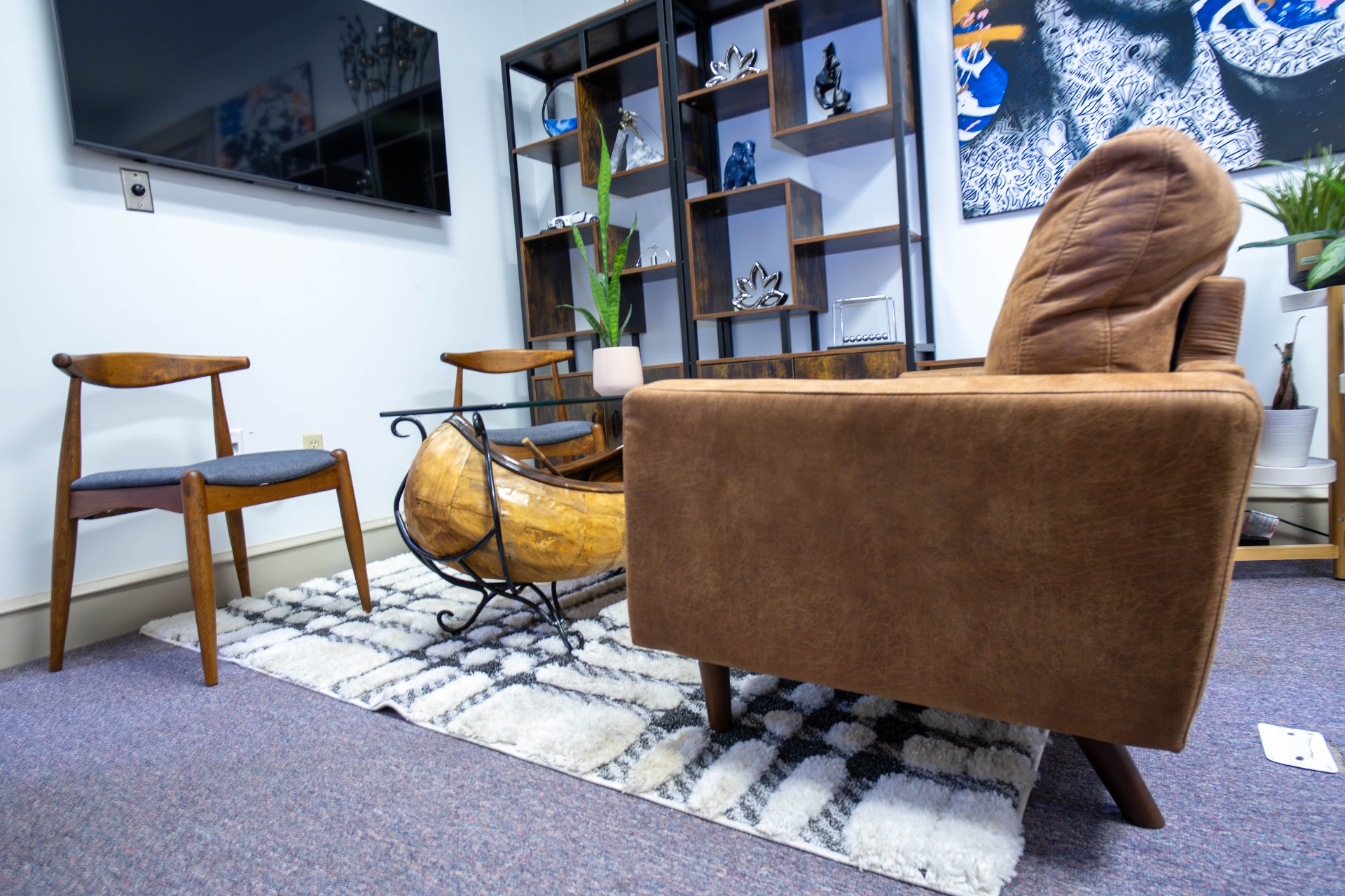 Alternate view of the lounge with sculptural canoe table